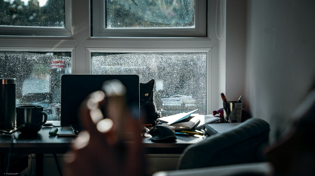 person feeling stressed at desk