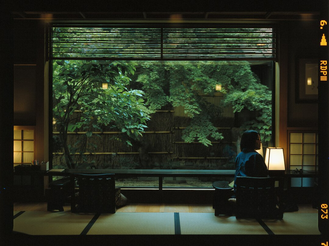 woman meditating in quiet room