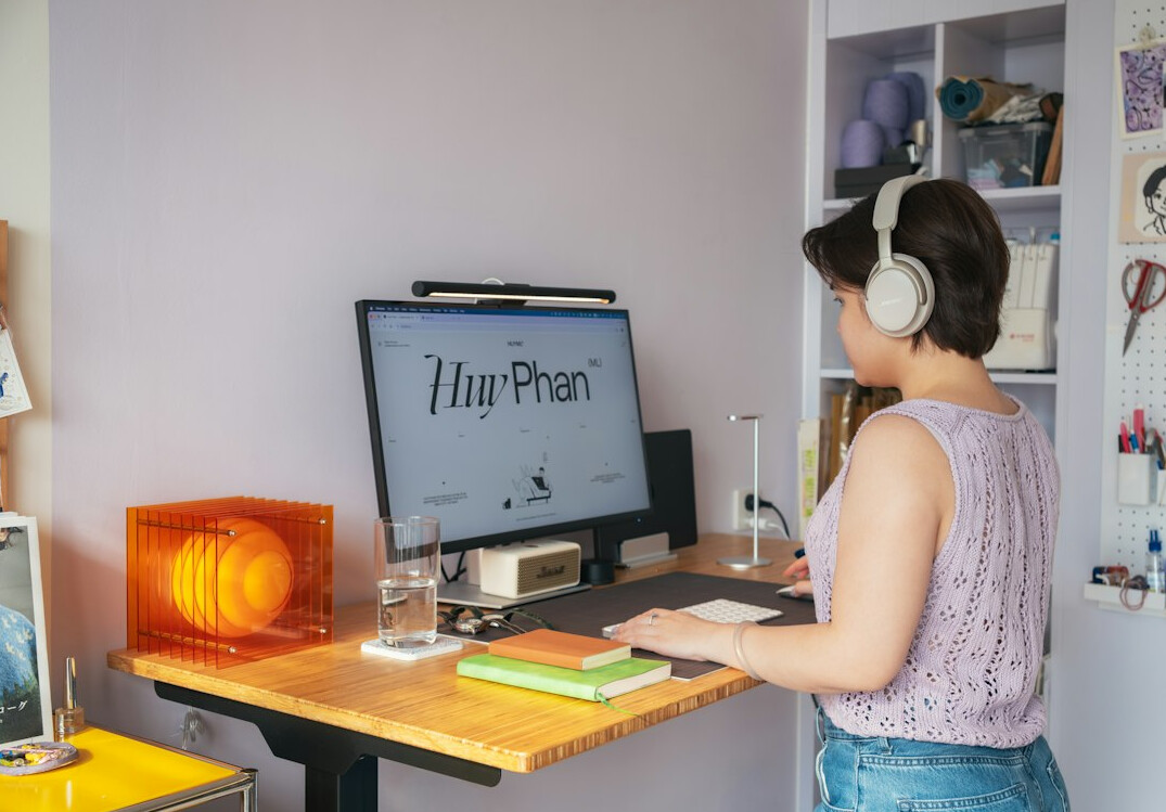 person using fitness app at desk