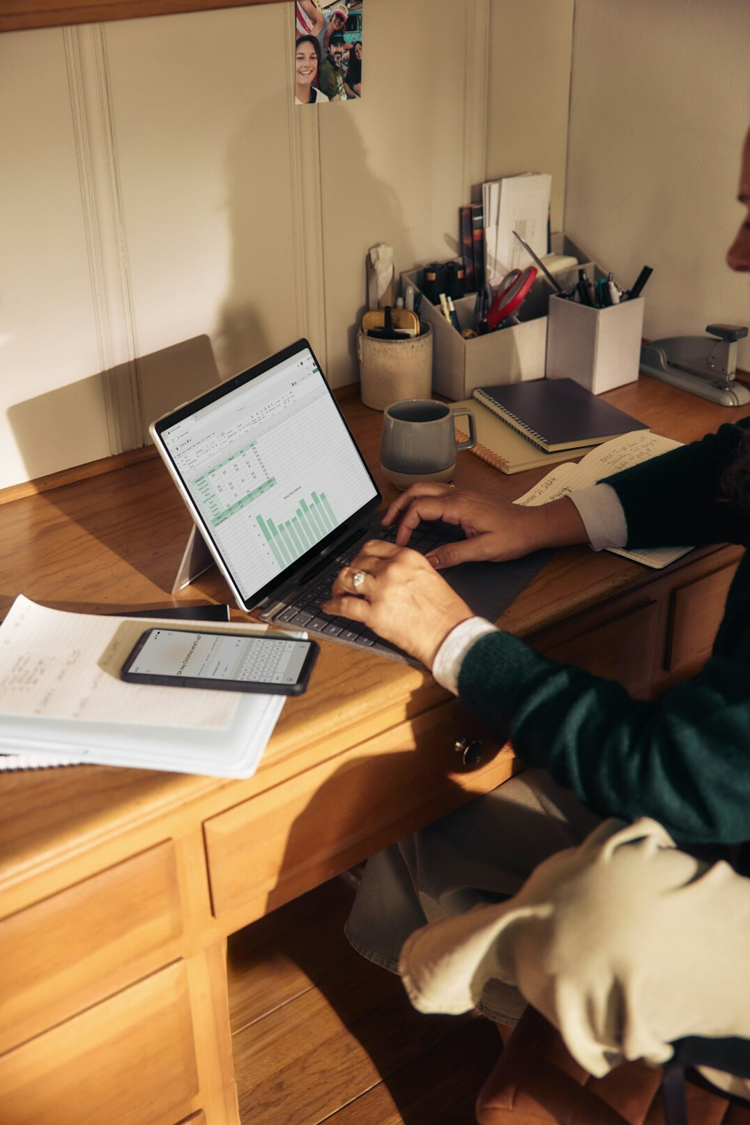 person working focused at desk